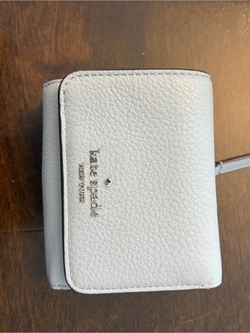 kate spade light blue pebble leather compact wallet. Smoke free